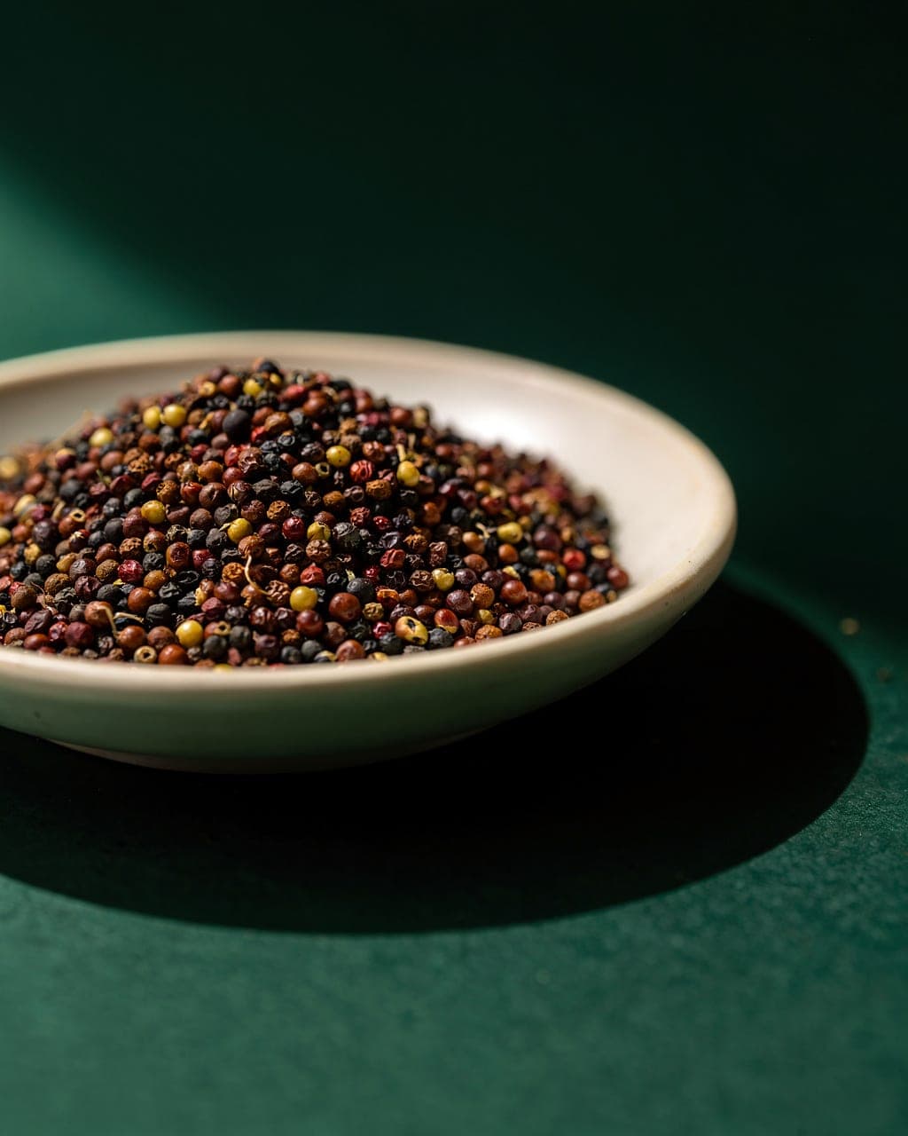 Brassica Blend — mixed seed in shallow dish · overhead